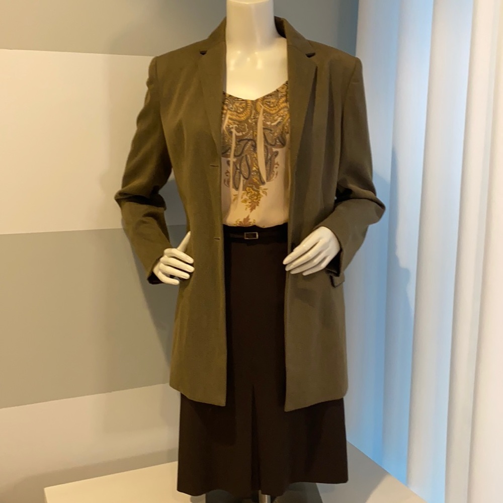Two piece fully lined suit (blazer and skirt) by Jones Wear.